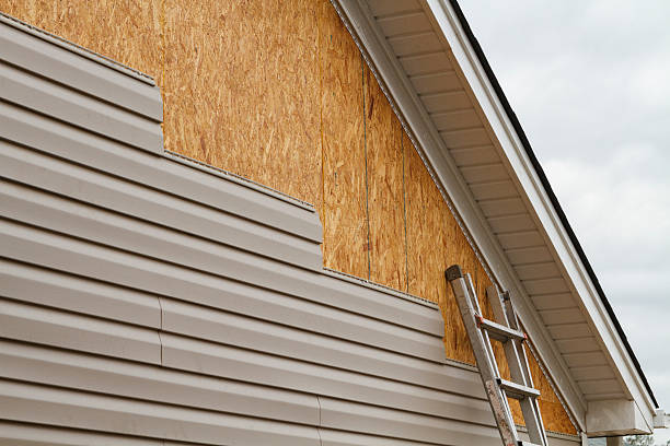 Professional Siding Replacement technician working in Milford Center, OH